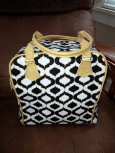 black white and gold bag