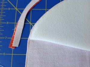 trim the fabric seam allowance to close to the seam line - about 1/8"