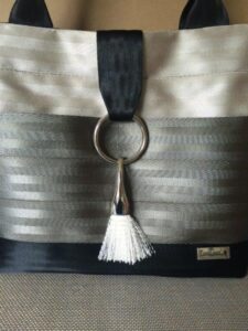 another example of the sleek drop tassel on a medium bag